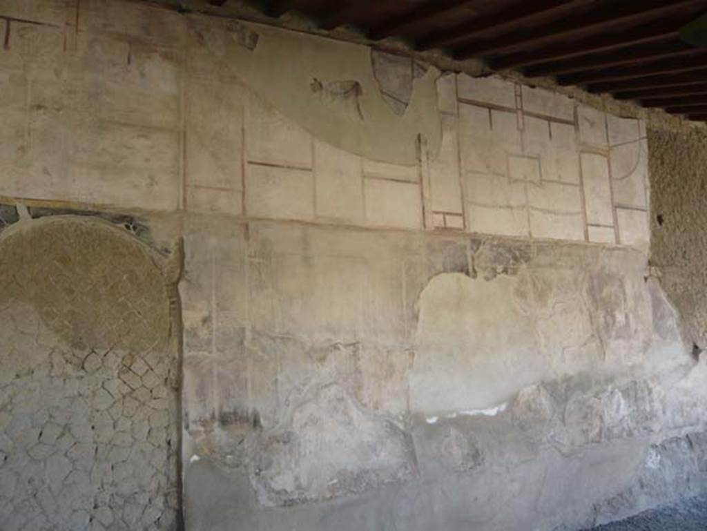 VI.1/7, Herculaneum. August 2013. East wall of east portico. Photo courtesy of Buzz Ferebee.